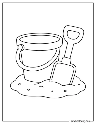 Bucket and Shovel on Sand